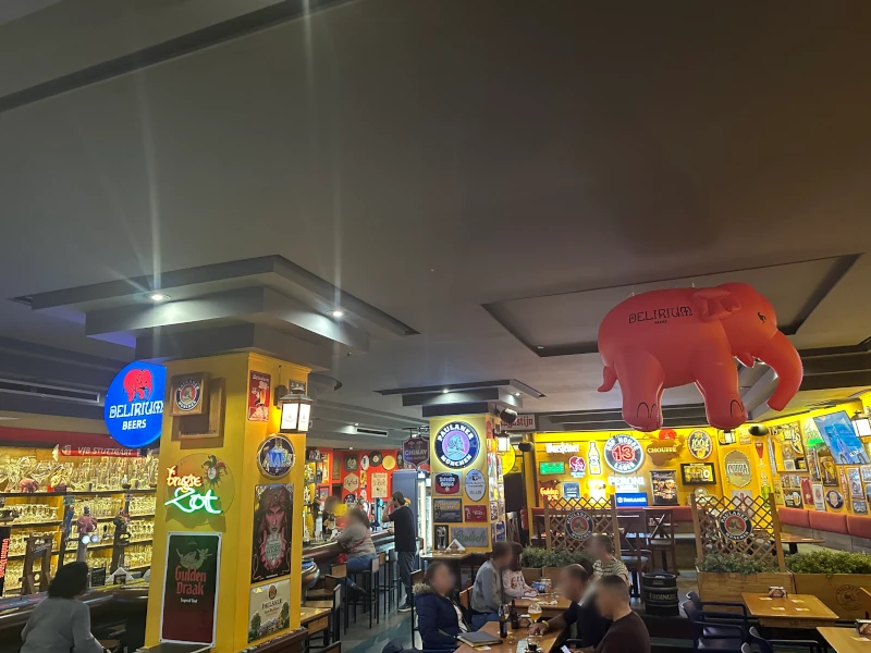 Wide view of Untertürkheim interior with inflatable pink Delirium elephant